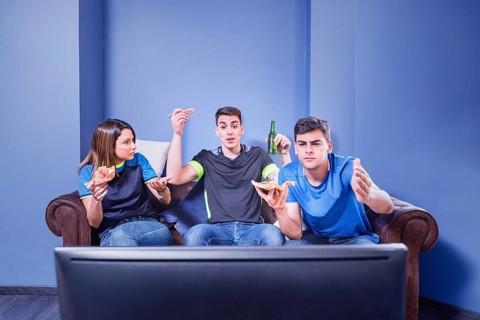 Football fans couch tv