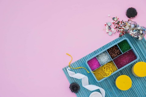 Colorful beads ribbon beads pink backdrop