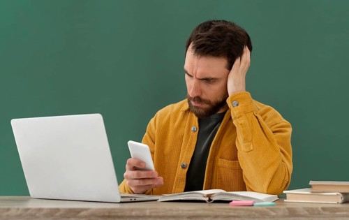 Stressed man working laptop_3