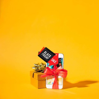 Smartphone near present box