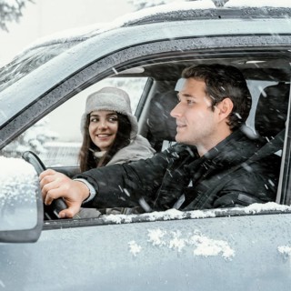 Side view couple together car while road trip