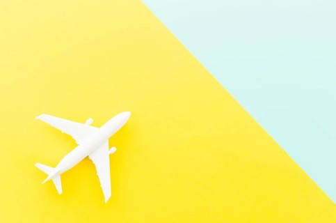 Small toy plane bright table