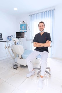 Happy confident dentist clinic
