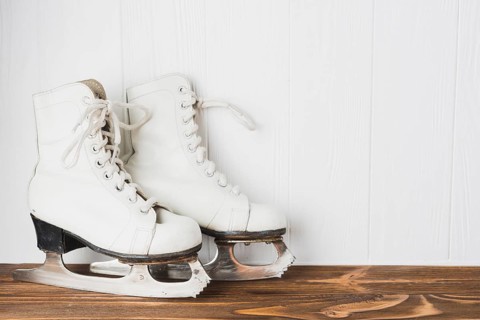 Ice skates wooden tabletop