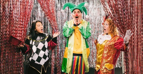 Low angle costumed friends party