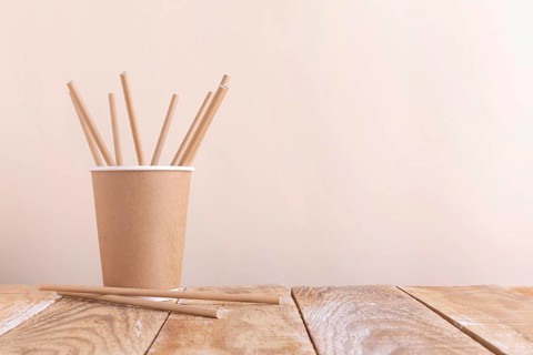Paper cup holding paper straws