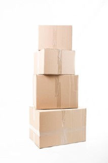 Stacked cardboard boxes isolated white background