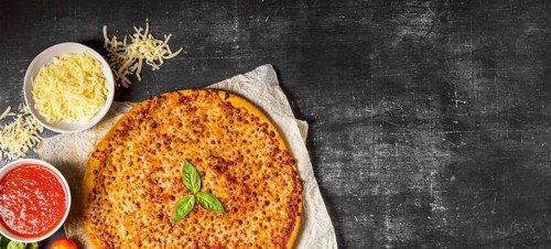 Top view pizza with tomato sauce mozzarella with copy space