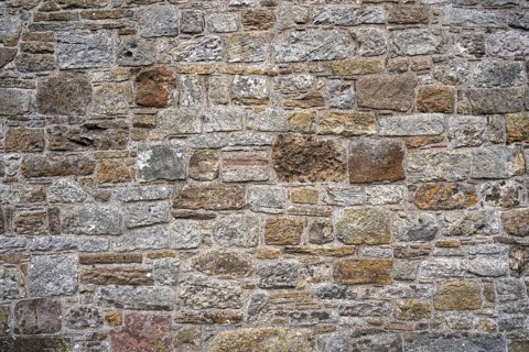 Wall stones made of different types of stone