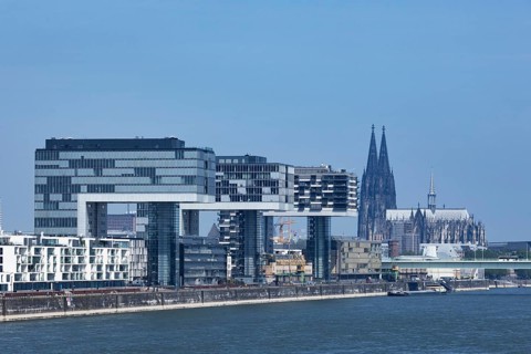 City view of the Rheinauhafen in Cologne with the 3 crane houses