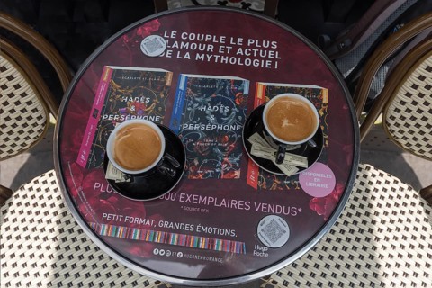 Two cups of coffee on a bistro table in a Paris cafe