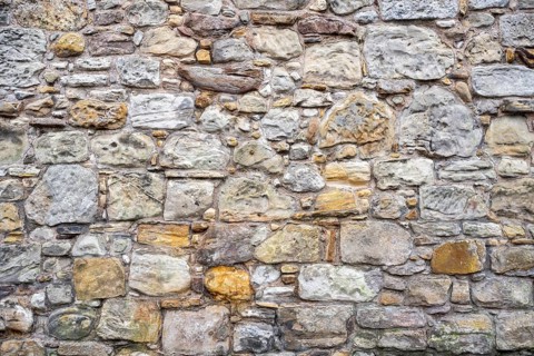 Wall stones made of different types of stone