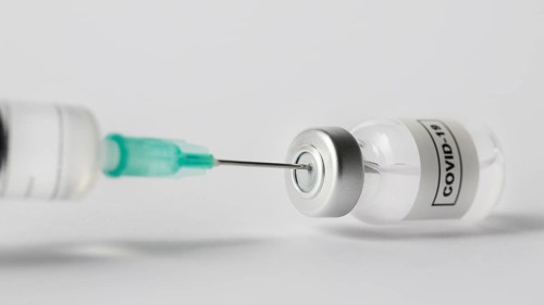 Front view syringe vaccine bottle