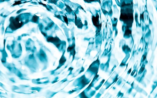 Close up blue crystalline water rings