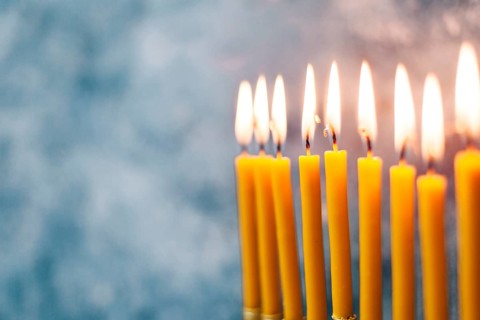 Close up holy candlesticks burning