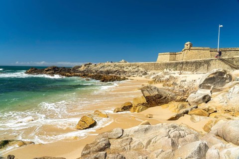 Praia da Senhora da Guia beach and Fort Forte de Sao Jao Baptista