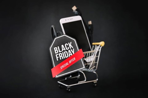 Black friday decoration with smartphone cart label