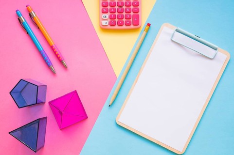 Calculator geometric shapes near school stuff