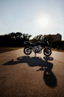 Motorbike sun with shadow