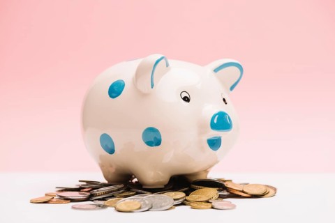 Spotted ceramic piggybank coins