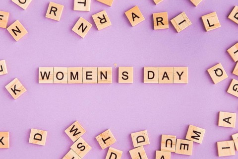 Women s day written scrabble letters