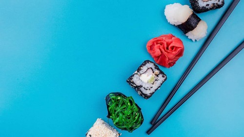 Delicious sushi rolls with copy space
