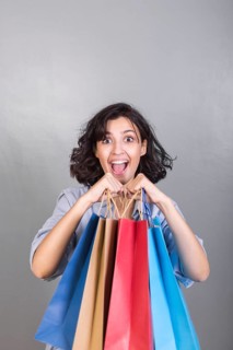 Happy woman with shopping bags