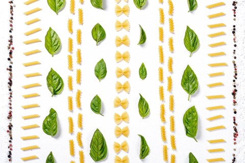 Top view pasta arrangement white background