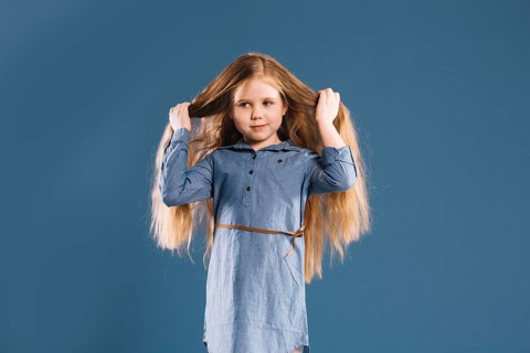 Cute girl touching hair