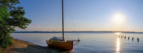 Small sailboat on the shore