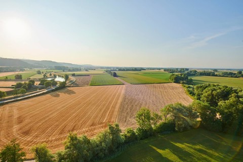 Aerial view over the fields and forests near Woerth an der Donau
