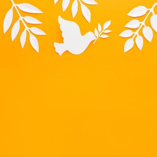 Top view paper dove with copy space paper leaves