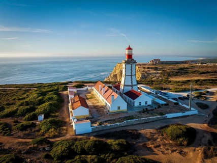 Aerial drone view of lighthouse on Cabo Espichel cape Espichel on Atlantic ocean