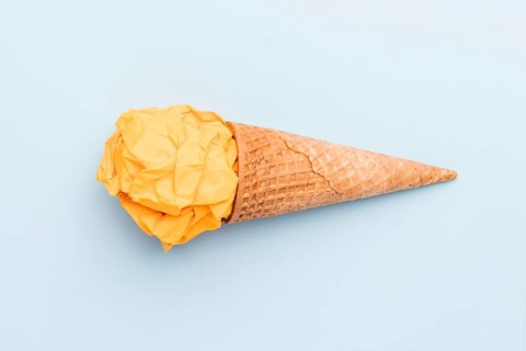 Fake yellow ice cream sugar cone