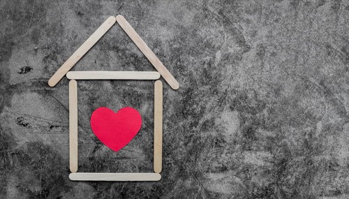 Creative ice cream wooden sticks house with red heart old wall