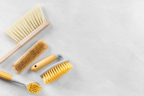 Top view cleaning brushes with copy space
