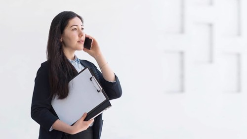 Side view woman with smartphone