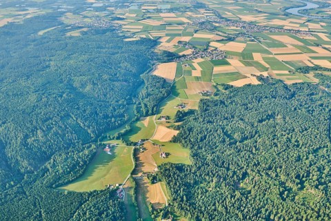 Aerial view over the fields and forests near Woerth an der Donau