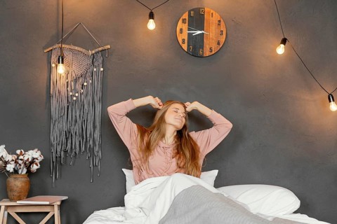 Medium shot woman waking up