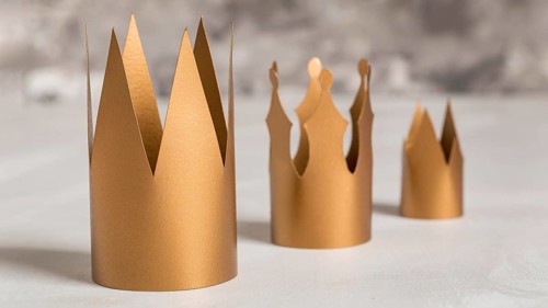 Golden crowns blurred background