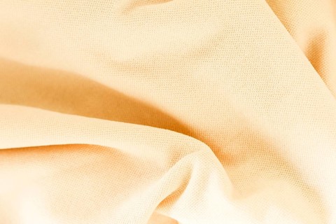Close up texture salmon fabric suit