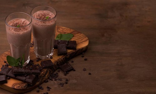 High angle milkshake glasses with copy space chocolate