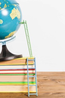 Paper ladder terrestrial global map stand ball books wooden table