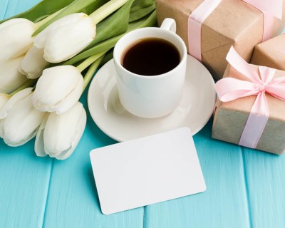 High view bouquet tulip flowers with morning coffee