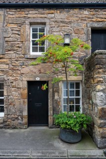 Old stone house in detail in the old town of St Andrews