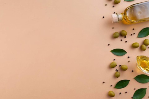 Olive oil frame background with copy space