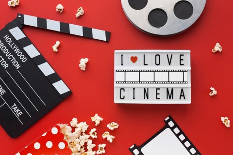 Flat lay cinema elements red background
