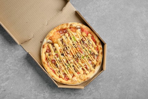 Top view of pizza with thin sausage