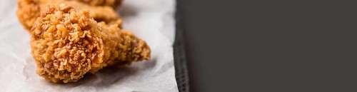 Close up fried chicken wings with copy space