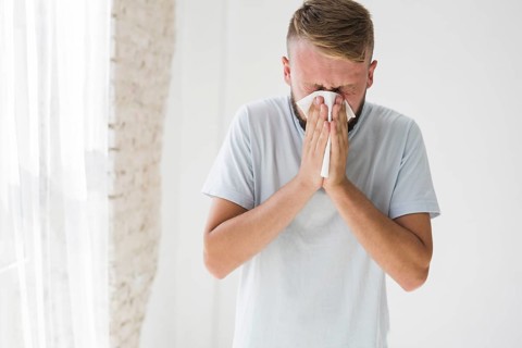 Male suffering from cold
